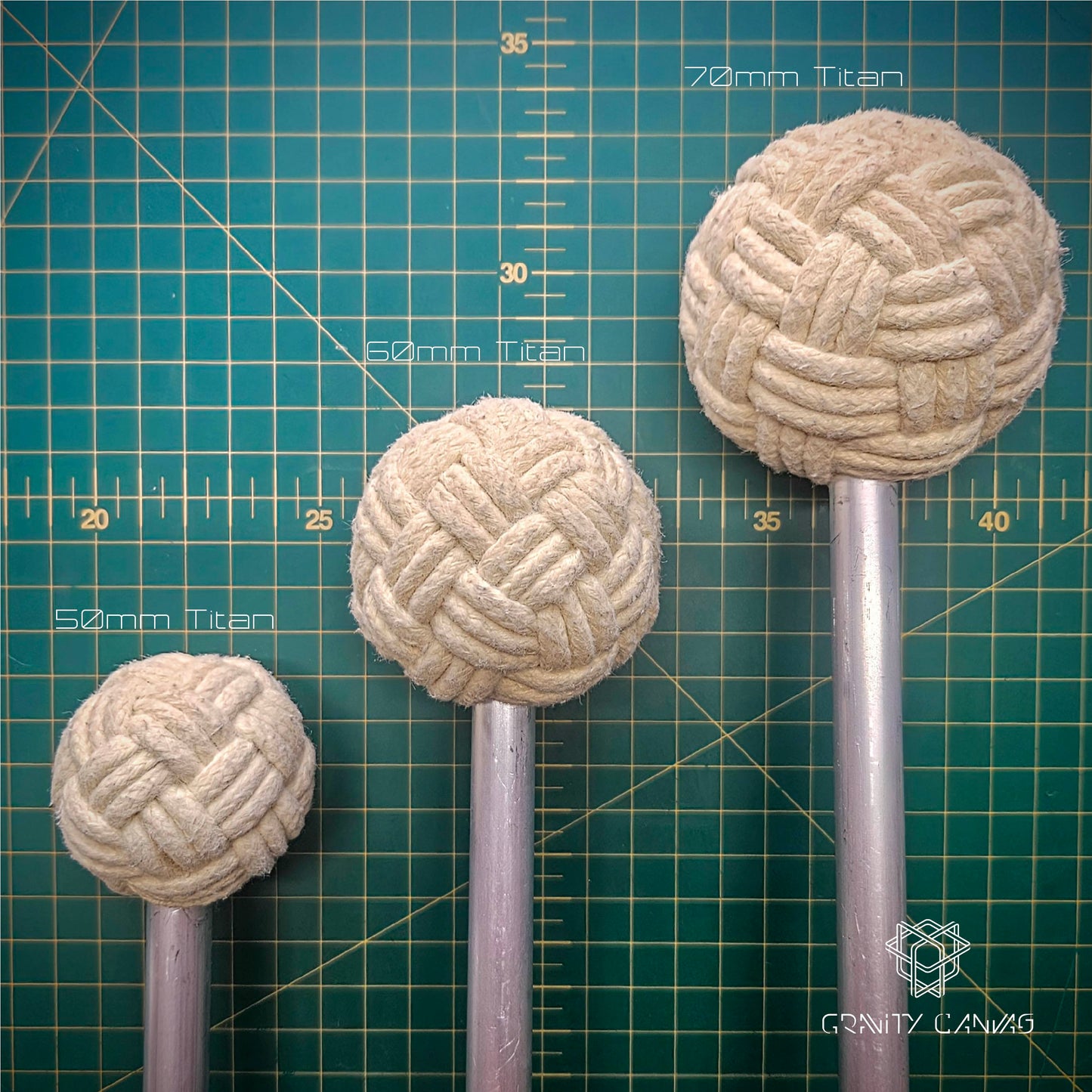 Spherical globe knot fire double staff heads